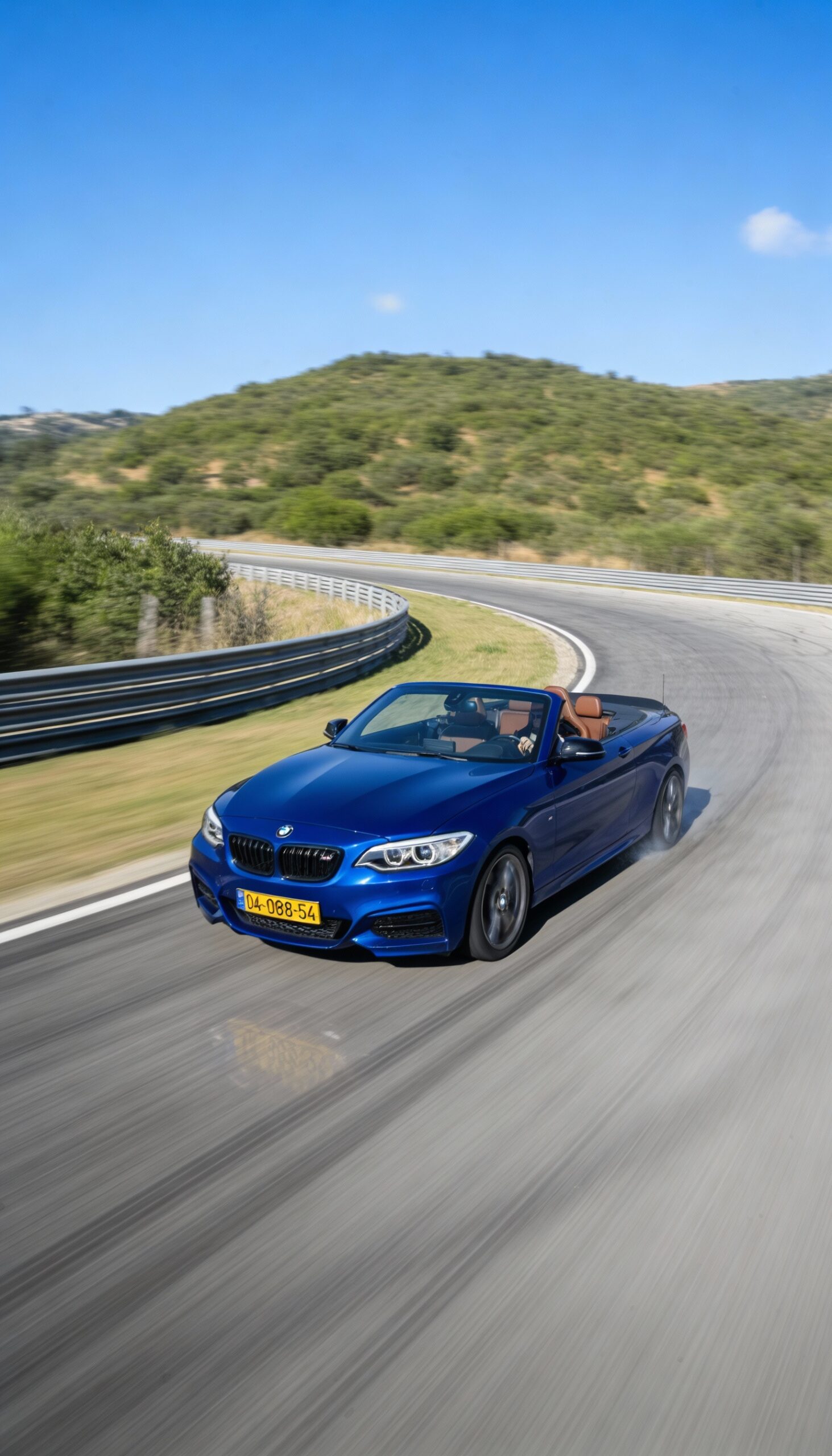 freepik__take-the-car-from-img2-and-motionblur-it-racing-do__71187